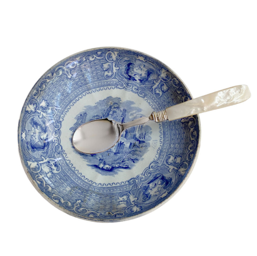 Antique Mother of Pearl and Silverplate Preserve Spoon on antique English transferware plate