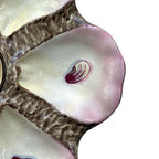 Detail showing authentic pink hand painted glaze on French antique plate