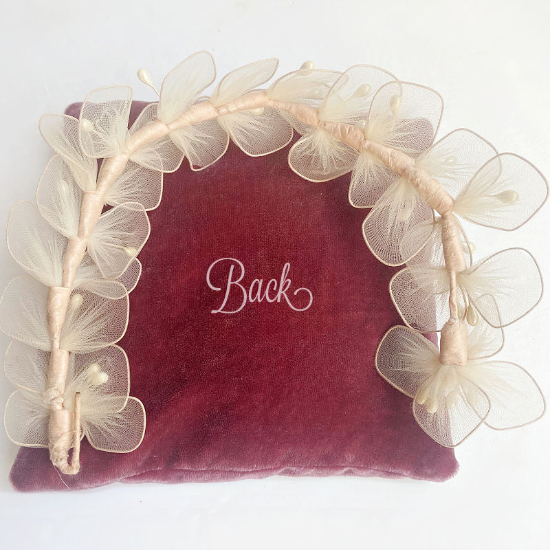 Ethereal Vintage Ballerina Pink Floral Head Crown with Pearlized Stamens II on pink silk velvet cushion