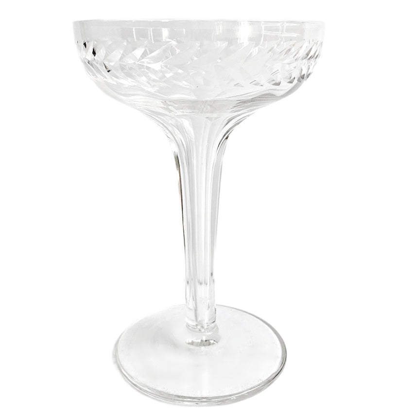 Art Deco hollow stem champagne coupes, set of 8, each with laurel wreath encircling the bowl. Hand-blown 1920s–30s glass, perfect for vintage bar décor.