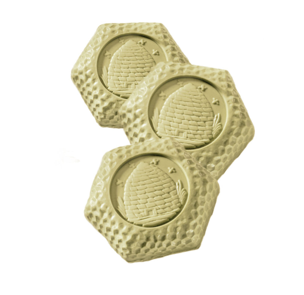 Bee Skep Gardener Soap Set of three hexagonal honeycomb soaps inspired by antique beehive skeps. A charming botanical gift for garden lovers.