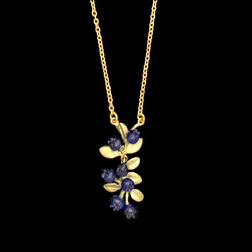 Blueberry necklace in patinated bronze, nature-inspired berry pendant with botanical detail, perfect for layering and woodland jewelry styling glass blue blueberries close up