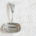 Exceptional early 19th-century sterling silver sugar sifter, 6‑1/2" x 3" x 2‑1/4", rare and collectible. Perfect for elegant table settings or luxury collections.