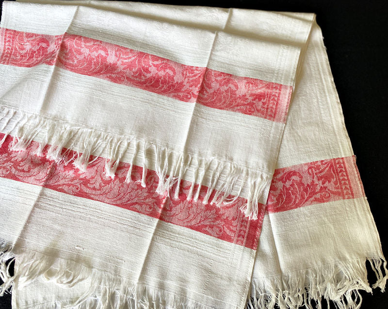 Pristine white linen with a foliate design woven in. Such a charming set of hand towels, the red borders have French Country scroll designs.