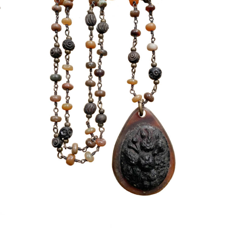 Antique Victorian gutta percha pendant on a tonal semi-precious beaded chain, 19th century, rare collectible jewelry, exquisite craftsmanship, collector’s piece.