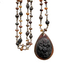 Antique Victorian gutta percha pendant on a tonal semi-precious beaded chain, 19th century, rare collectible jewelry, exquisite craftsmanship, collector’s piece.