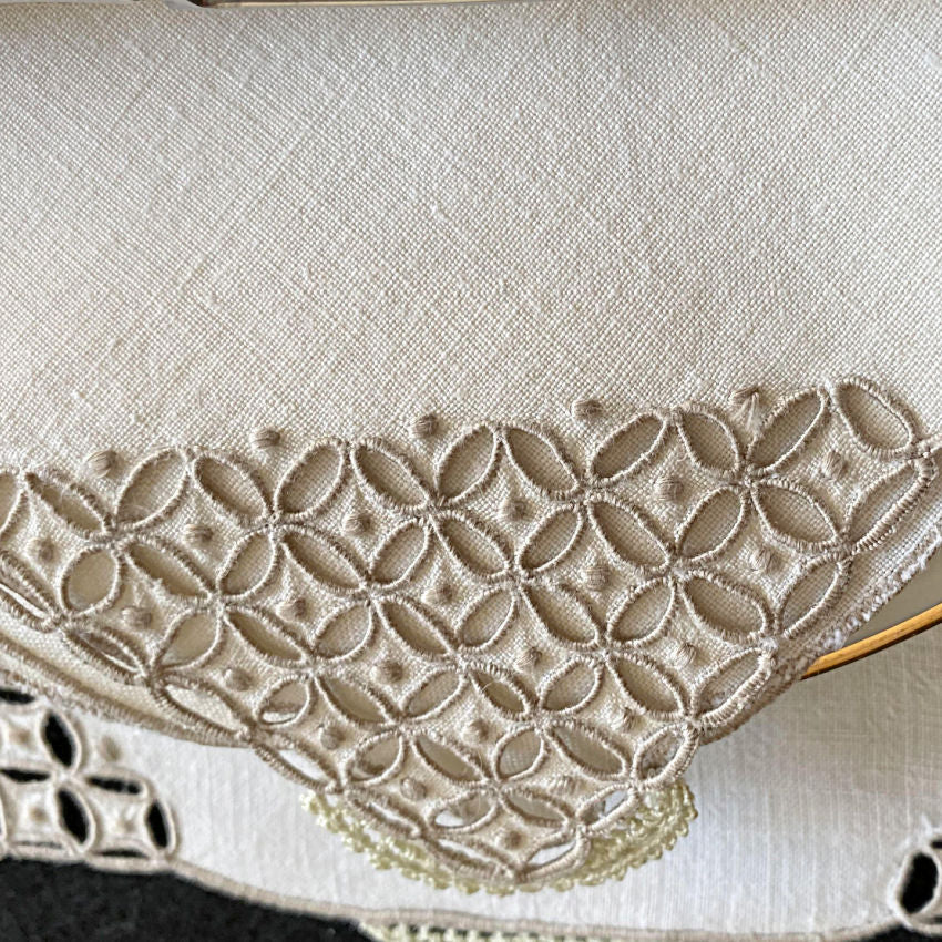 Detailed view of exquisite hand stitched Marghab linen embroidery