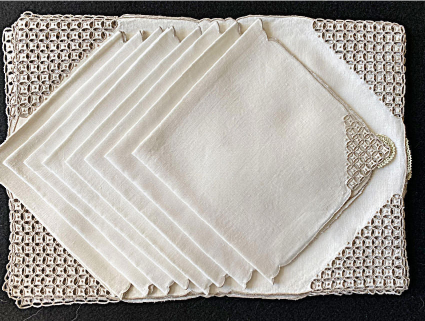 Detailed view of exquisite hand stitched Marghab linen embroidery