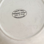 Close-up of Portmeirion Pottery mark on Staffordshire plates from England