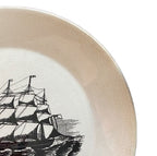 Close-up ofSailboat plate with clean graphic detailing and craquelure