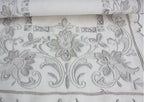 Antique hand embroidered linen table setting for six with tulip embroidery- showing detail of embroidery work