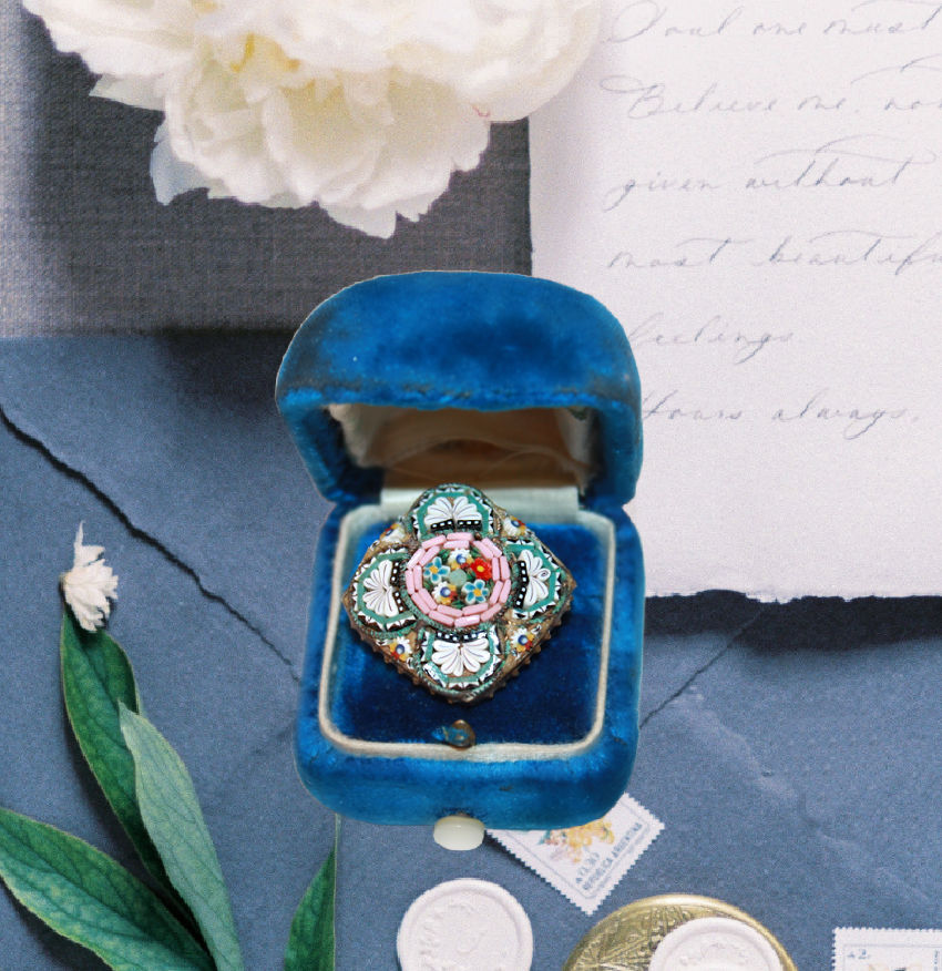 Antique Italian micro mosaic floral square brooch displayed in a blue velvet box with a floral design, in an antique box