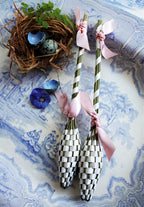 French lavender sachet wands for linens and drawers on a light blue antique platter with birds nest and pink ribbons