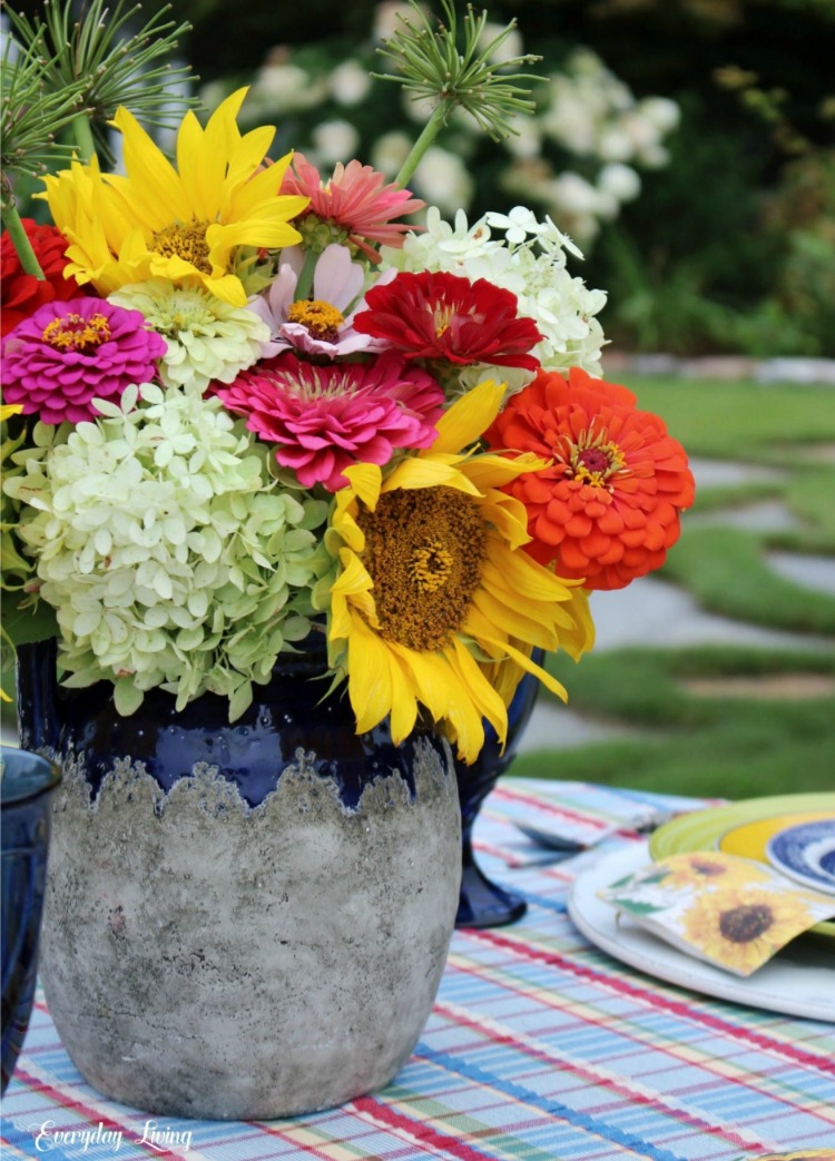 summer sunflowers in an antique French confit pot