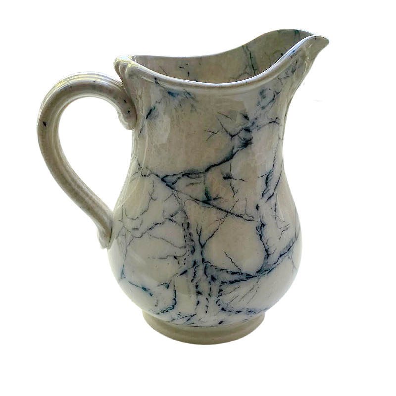 Rare antique ironstone pitcher in blue and white marble design