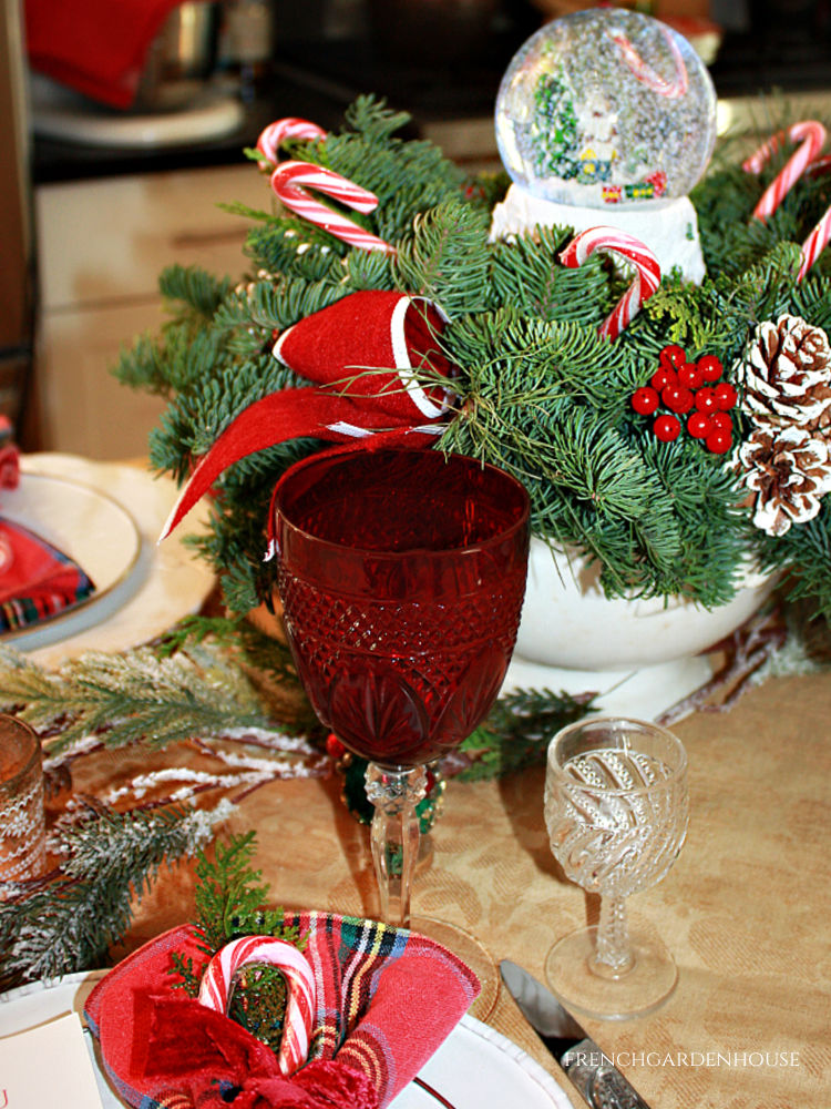 red glasses for holiday table setting