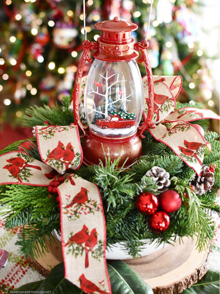 holiday centerpiece with lighted lantern inside