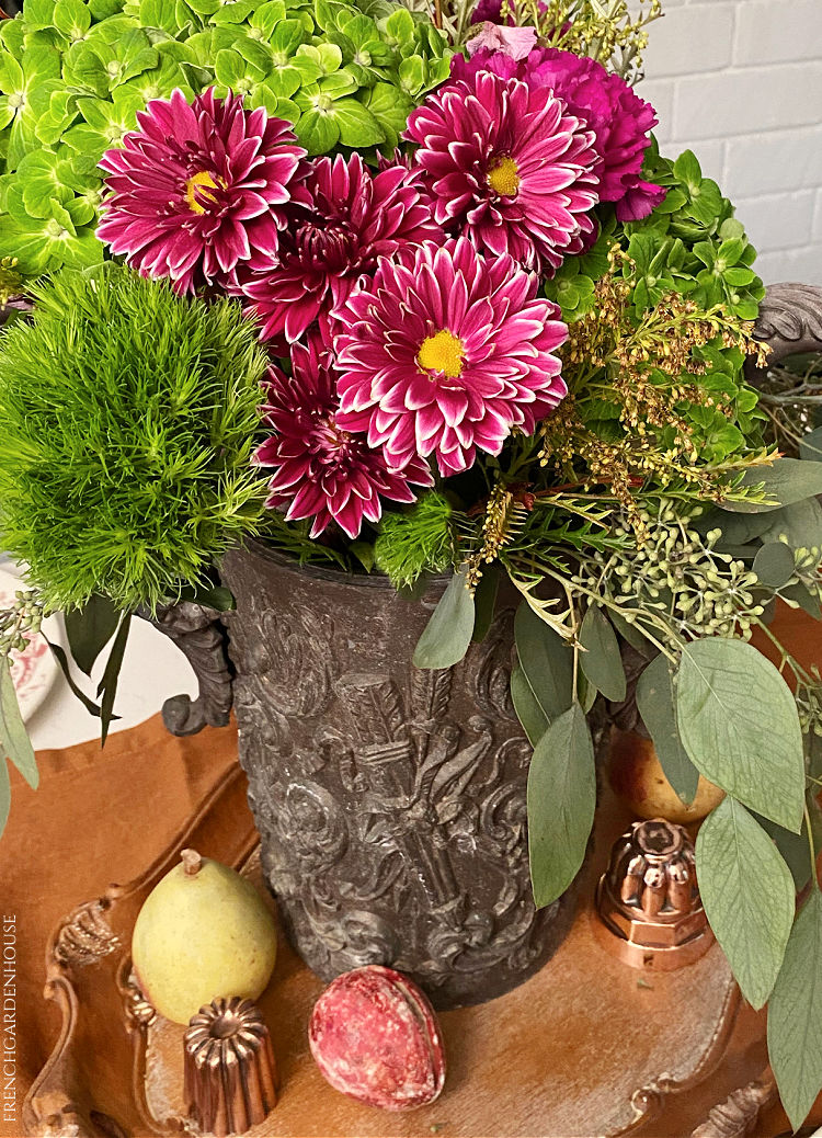 Antique French urn with fall flowers