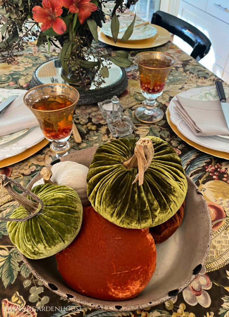 antique bow with velvet pumpkins