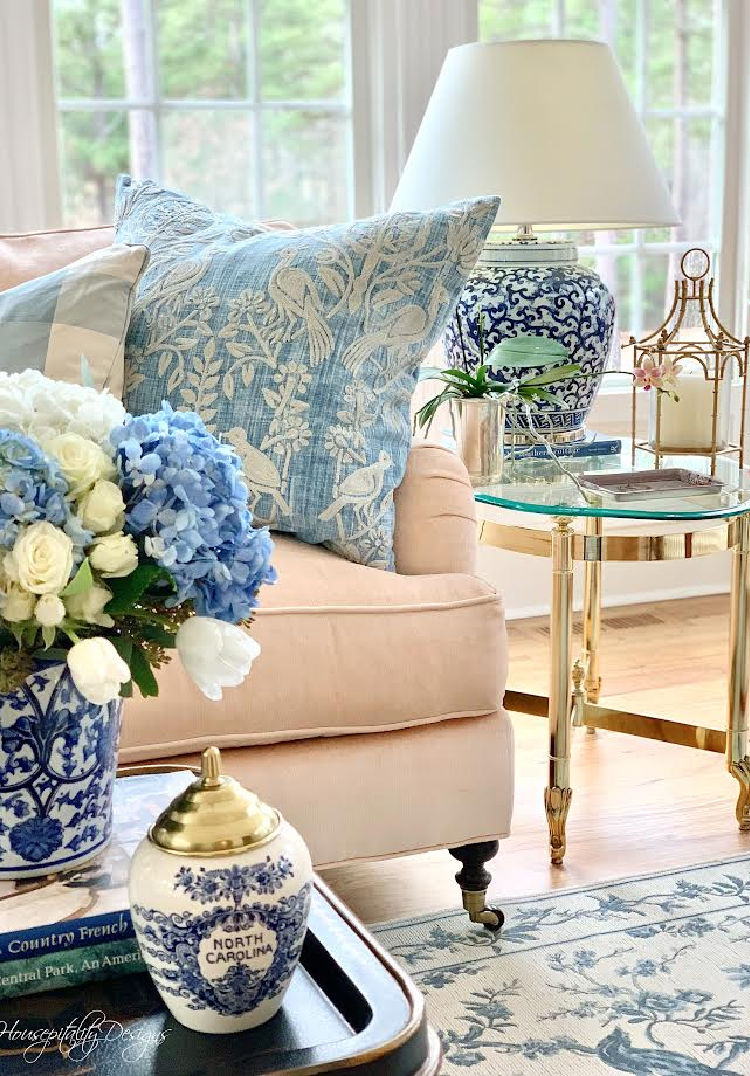 Blue and white hydrangeas in sunroom