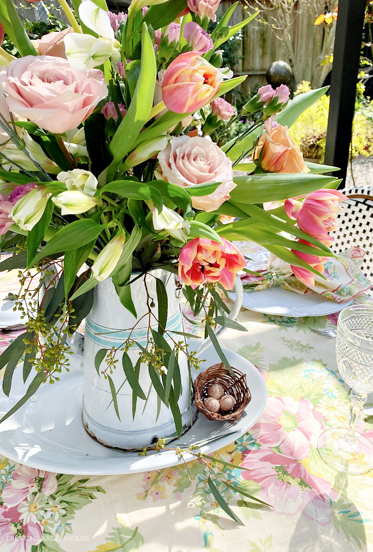 Spring Easter centerpiece with roses and tulips