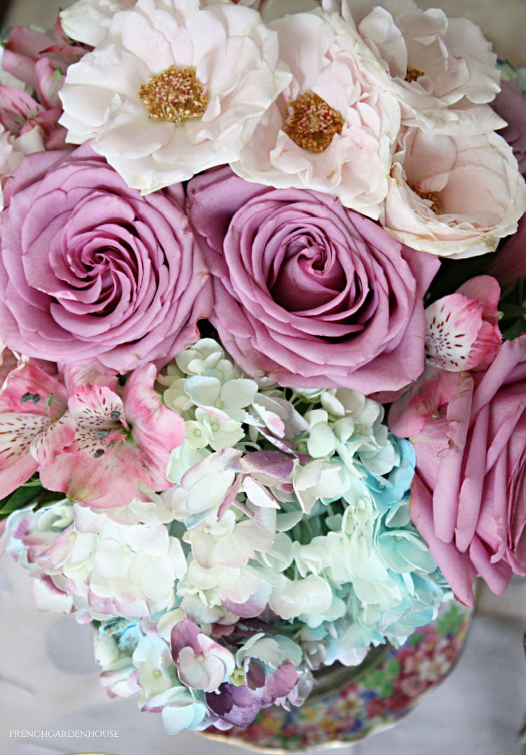 pink roses blue hydrangeas