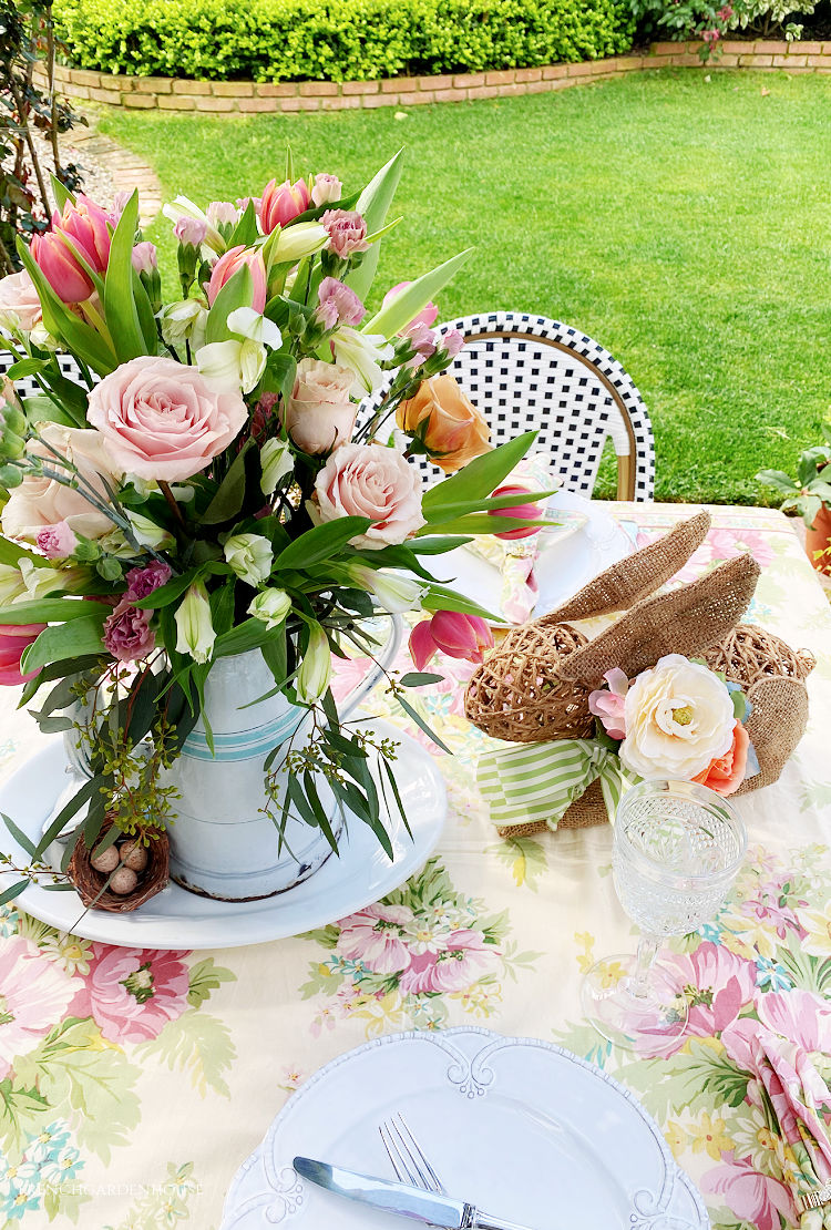 Spring centerpiece with pink roses and tulips