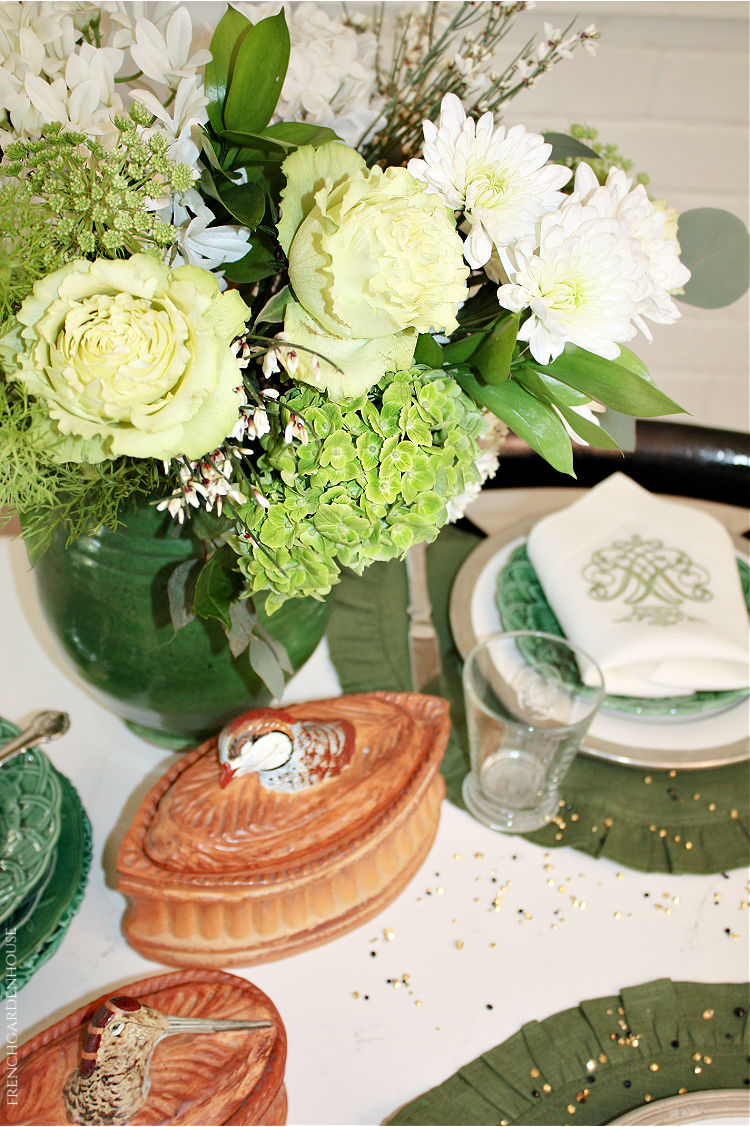 roses in antique French green pottery