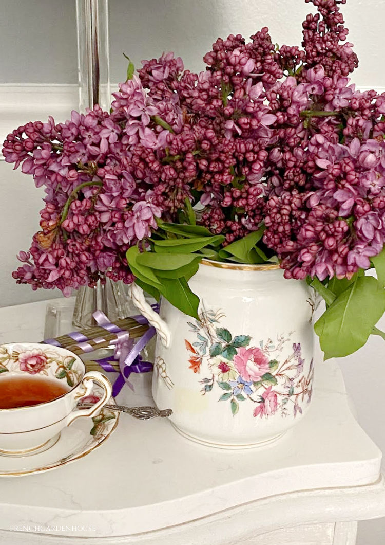 Lilacs in an antique floral vase