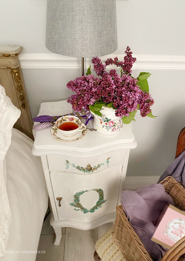 Lilacs in antique vase