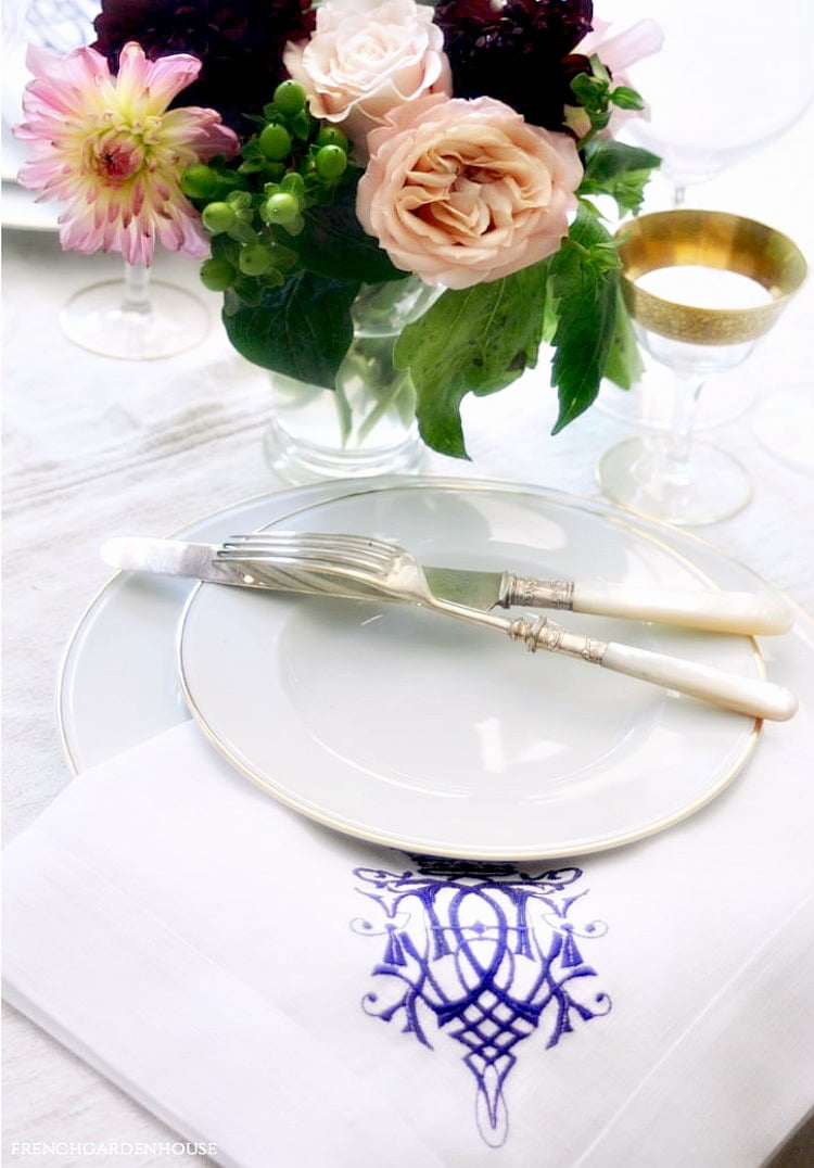 white table setting with flowers