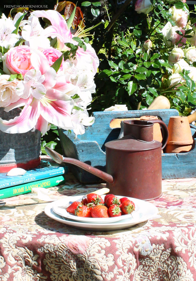 antique small watering can