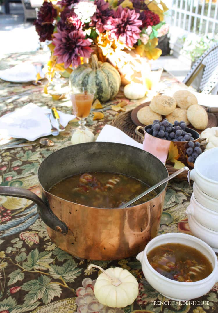 soup served in copper pan