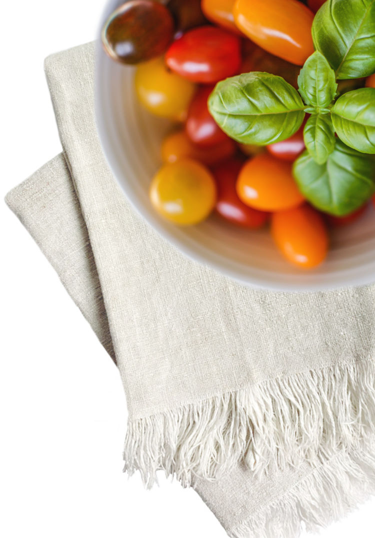 Tomatoes on antique French towel