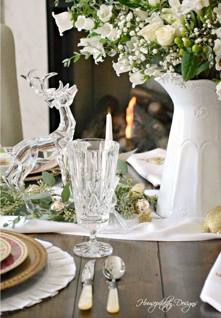 christmas table with white pitcher